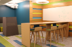 The space was designed with areas for students to gather. Conference rooms, casual seating nooks and kitchen spaces are tucked into various corners throughout the floor, along with plenty of dry-erase boards for mapping out new ideas on the fly.