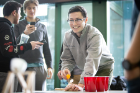 Senior biomedical engineering student Rick Zirkel, a member of the Biomedical Engineering Society (BMES) student club, took a low-tech approach to the Catapult Pong competition during Engineers Week. Photo: Meredith Forrest Kulwicki