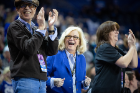 Fran Letro (left), a UB Law alum and benefactor, and his wife, Cindy (center, blue jacket), were among the raucous fans at Saturday afternoon's game.