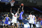 Rutgers' Victoria Harris attempts to defend a shot by UB's Theresa Onwuku. Photo: Meredith Forrest Kulwicki