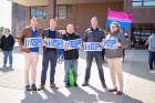 Supporters of UB's LGBTQ Faculty and Staff Association stand outside Capen Hall.