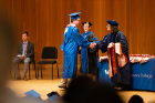 Offering their congratulations to an Honors graduate are Ann Bisantz (center), dean of undergraduate education, and Dalia Muller (right), director of the Honors College. Photo: Douglas Levere