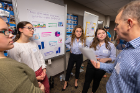 Dietrich Kuhlmann (far right), research professor and undergraduate director in the Department of Biostatistics, chats with (from left) Erin Watson, Abigail Bradley, Grace Young and Emily Bingham of Mount St. Mary's. Photo: Douglas Levere