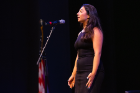 Third-year law student Sarah Grimaldi sings the national anthem. Photo: Douglas Levere