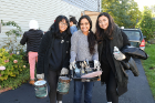 At None Like You/We Care, 595 Sycamore St., UB students (from left) Peony Chhum, a senior psychology major; Shefa Rizvi, a sophomore business major; and Shania Julia Anunciacion, a junior environmental design major, are ready to get down to work.