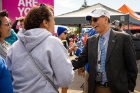 President Satish K. Tripathi greets fans at a tailgater before Saturday's game. Photo: Meredith Forrest Kulwicki 