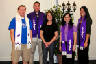 2009 graduating Native students wear custom-made stoles that symbolize the Haudenosaunee nations and clans. The students, from left: Aaron VanEvery, Ross John Jr, Jamie Marr, and Ashley Schultz.