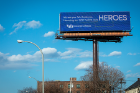 The digital billboard greets travelers as they near the end of the expressway in downtown Buffalo. It is on view through May 17.