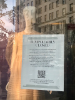 A sign in the window of a Bergdorf Goodman store noting a temporary closure caused by Covid-19 in 2020. 