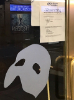 A theatre door featuring the mask from "Phantom of the Opera" and a note stating the theatre is closed in 2020. 