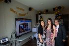Grace Guadalupe with her parents at her virtual commencement ceremony. She will conduct research for a year before beginning a residency in family medicine. 