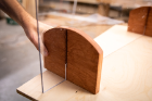 Wood blocks support the shield and hold it into place.