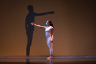 Kyle Kershner (shadow) and Stephanie Avila perform. This semester, lab operating procedures and a module scheduling system allowed for 60-plus dancers and choreographers, and more than 20 designers and technicians to be able to work in person to create new works of concert dance.