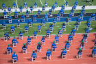 Closer to the ground, the graduates are seated — with plenty of space — on the stadium field. Photo: Meredith Forrest Kulwicki