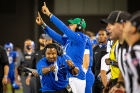 UB head football coach Maurice Linguist celebrates a Bulls first down. Photo: Meredith Forrest Kulwicki