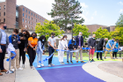 The ribbon is cut! The artwork, completed last month, features quadrangular shapes of 11 different colors painted along the V-shaped sidewalk enclosed by Knox Hall, Bell Hall and the Student Union.