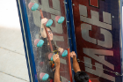 Sarah Hennessy, a sophomore studying neuroscience, challenges a friend on the rock wall.