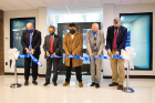 Cutting the ribbon to officially open the LevelUp gaming lounge and esports arena are, from left, Brian Hamluk, vice president for student life; President Satish K. Tripathi; Student Association President Nicholas Singh, a senior civil engineering major and communication minor; Brice Bible, vice president and chief information officer; and Provost A. Scott Weber.