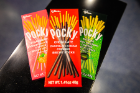 A selection of Pocky: strawberry-, chocolate- and macha-dipped biscuit snacks.