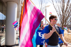 Others carried flags denoting lesbian, transgender and non-binary pride.