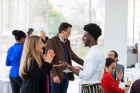 During the reception in the Greatbatch Pavilion, the VITAL scholars had a chance to mingle with members of the UB community. Despina Stratigakos (left), vice provost for inclusive excellence, chats with Rashad Williams. Photo: Douglas Levere