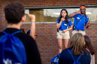 Orientation leaders Pooja Nattu (left) and Malacchi Johnson tell students they should call 716-645-2222 — not 911 — for emergencies on campus.