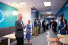 The Fast 46 networking event gets underway on Sept. 16. Thomas McArthur, associate vice president for alumni engagement and annual giving (far left), and Arlene Kaukus, director of the Career Design Center, welcome participants to the event.