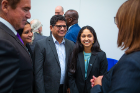 Following the event, Krishnan and her parents — mother, Bhuvana, and father, Krishnan — mingle with other dignitaries including Higgins (far left). Photo: Douglas Levere