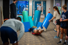 Occupational therapists are always looking for that “just-right challenge,” an apt description for this fun experience of accelerating down a ramp and safely encountering a wall of bolsters.