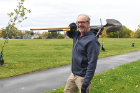 Jim Jones of Go Bike Buffalo and a member of the Tool Library, walks down William L. Gaiter Parkway. "I'm on my way to plant some trees," he said.