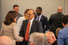 Gov. Kathy Hochul shakes hands with UB President Satish K. Tripathi, who thanked the governor for her "support and vision of excellence for SUNY and UB." 