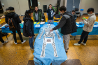 The BMES’s (Biomedical Engineering Society) Life Size Operation event was also on Wednesday. Given three scenarios, participants had to save the patient as quickly as possible by selecting the correct device for the procedure and placing it in the correct position on the patient. Photo: Douglas Levere