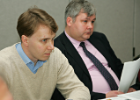 Group facilitator Denis V. Pryamonosov (l) and Andrey P. Rachin (r), Dean of the School of Professional Development & Retraining and Professor of Neurology & Psychiatry at Smolensk State Medical Academy, listen to the conversation.