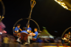 Students on a carnival ride at the New Student Carnival. 