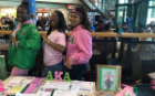 Members of Alpha Kappa Alpha Sorority, Inc. sharing information about their organization with the UB community. 