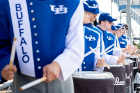 UB Drumline performing in the stands during a UB football game.