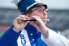 UB Marching Band piccolo player performing.