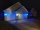 A UB grad has lit their garage blue to show their True Blue spirit during UB's Homecoming and family weekend. 