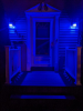UB staff member lights up porch blue for Homecoming and family weekend.