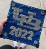 "The design was influenced from my 2019 high school graduation and I wanted to showcase the interlocking UB to represent my love for participating in the class photo during welcome week my freshman year. The 2022 not only shows the year I graduate but how I achieved graduating a whole year ahead." -Alex Rothenburgh, Honorable Mention