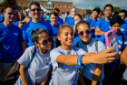 Students take a selfie during the assembly of the interlocking UB.