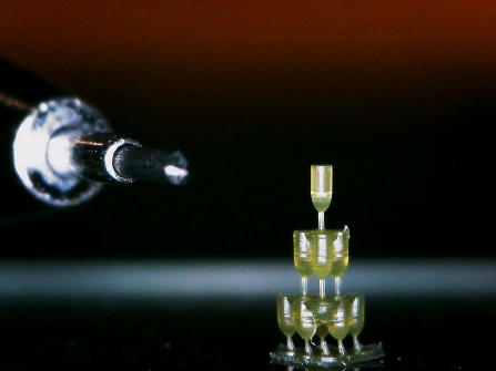 3D printed micro-valve that looks similar to a champagne flute tower. 
