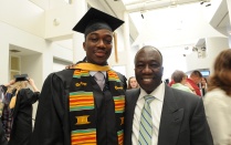 male graduate and father. 