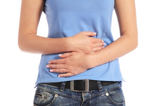 A woman with stomach ache. 