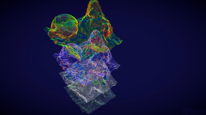 Zoom image: A four-layered model with each layer using small dots of different colored to depict varying characteristics of the surface of a coral reef.