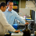 UB researcher Jonathan Lovell and PhD student Kevin Carter in the lab. 