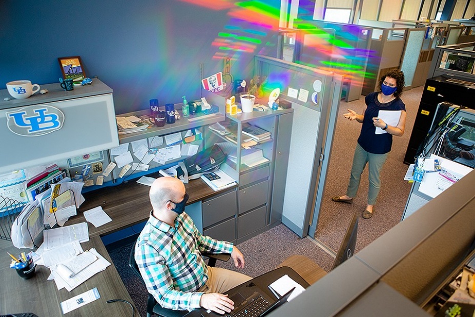 Zoom image: Wearing masks while on campus is a key component of the Health and Safety guidelines. Photo: Douglas Levere 