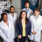 Emanuela Gionfriddo (center) with her students in her lab. 