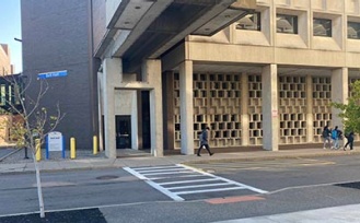 Path to the barrier-free entrance on the north side of Bell Hall from the Furnas parking lot. 