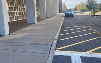 Path to the barrier-free entrance on the north side of Bell Hall. 